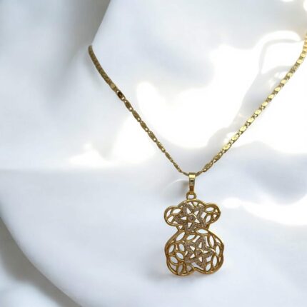 Naszyjnik stal chirurgiczna złoty miś z białymi ażurowymi kwiatuszkami