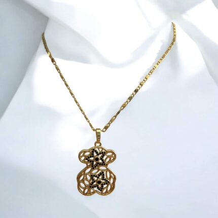 Naszyjnik stal chirurgiczna złoty miś z czarnymi ażurowymi kwiatuszkami