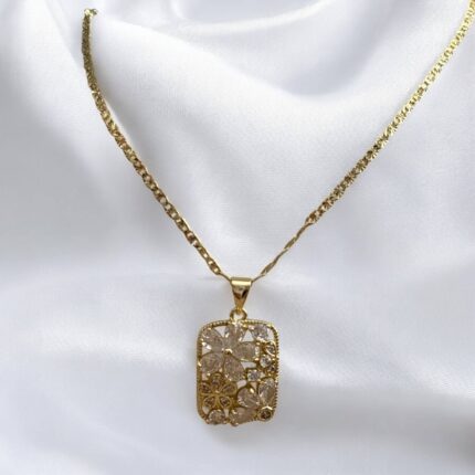 Naszyjnik stal chirurgiczna złoty prostokąt z białymi kryształowymi kwiatuszkami