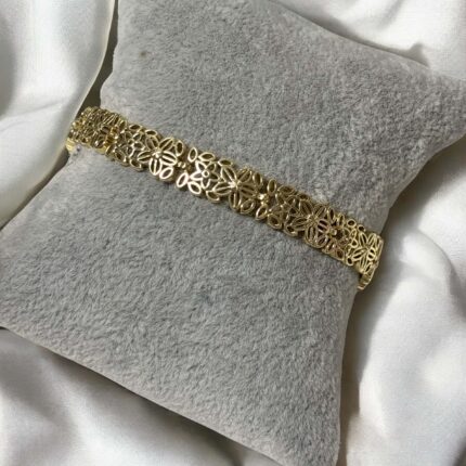 Bransoletka stal chirurgiczna złota ażurowe kwiatuszki